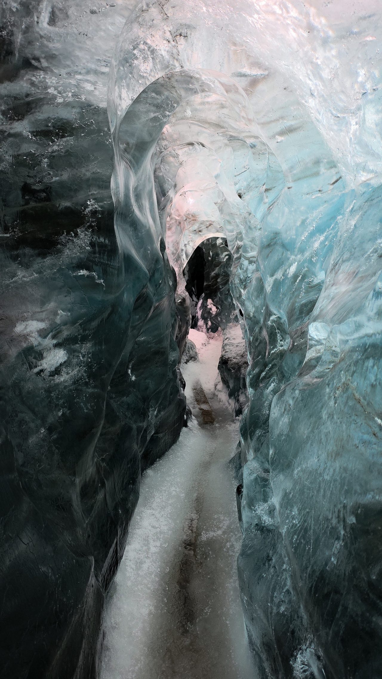 Inside a blue glacier ice cave